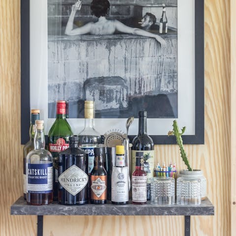 Mix up a cocktail from the curated home bar