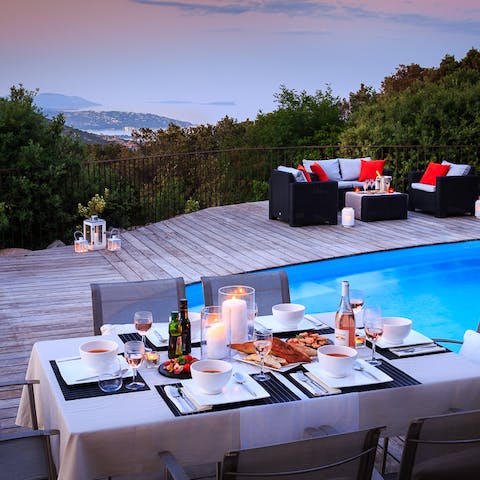 Dine alfresco while the sun sets over the mountains