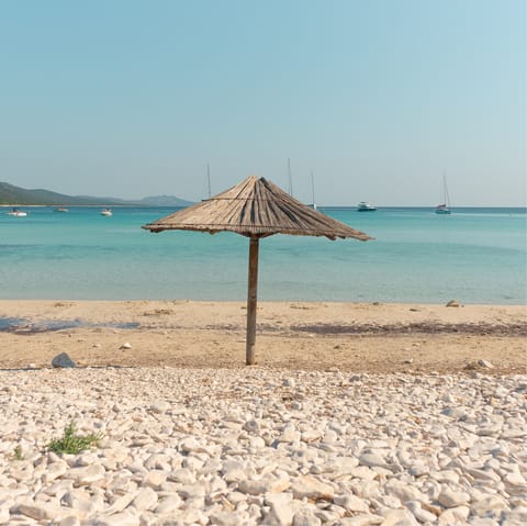 Spend an afternoon on Ipsos Beach, a short drive away