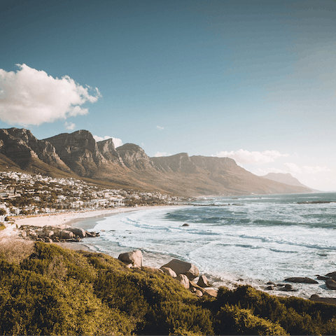 Hit the surf at Camps Bay Beach – this incredible home is at the top of Camps Bay