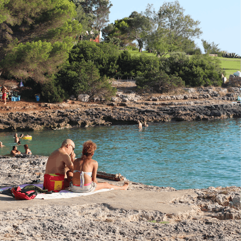 Pop down to Portocolom beach, a 30 minute drive down the road