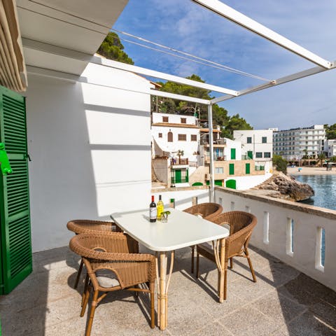 Enjoy an alfresco meal on the balcony