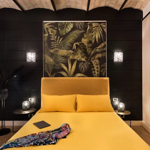 Have some rest after exploring the Eternal City in the tropical style bedroom