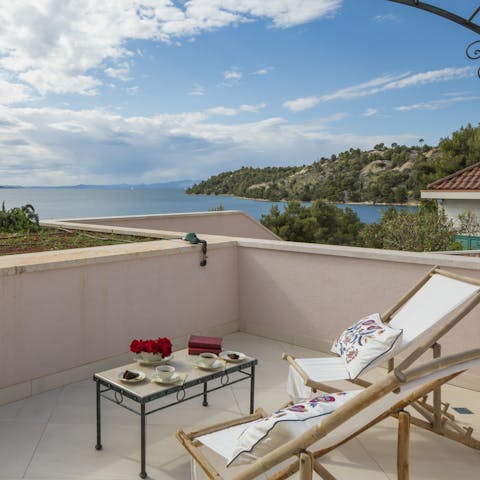 Soak up the glorious sea vistas from the balcony with morning coffees