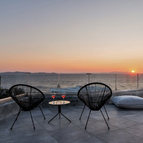Watch the sunset over the sea, a perfect way to end the day in Mykonos