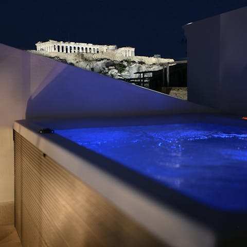Unwind in the Jacuzzi with a view of the city's famous landmark