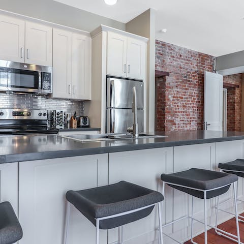 Pull up a seat and enjoy a coffee in the modern kitchen