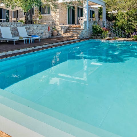 Swim gentle laps in the private swimming pool 