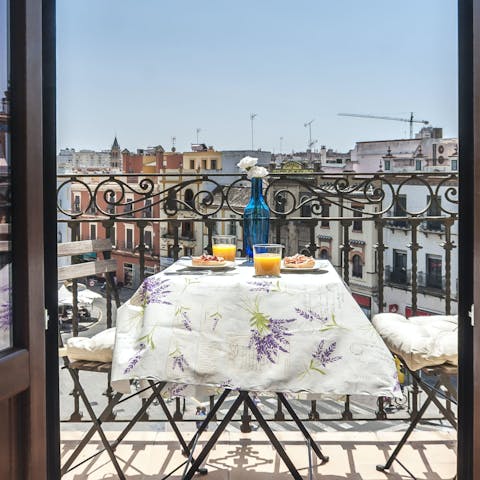 Take in the views over Plaza del Altozano from the private balcony