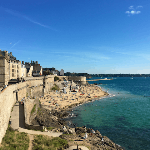 Explore the port city of Saint-Malo with its stunning sea vistas and beautiful historic buildings