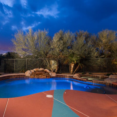 Take a dip in the pool or relax in the hot tub while admiring the desert sky