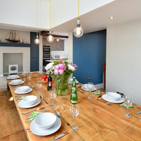 Enjoy family dinners together at the long wooden dining table