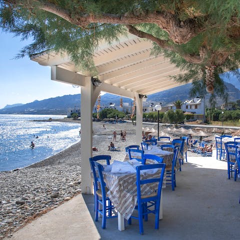 Sample local seafood at one of the beachfront tavernas 