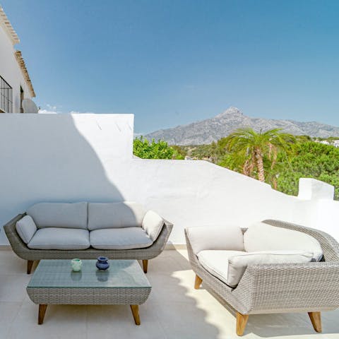 Take in the breathtaking mountain views from the private terrace