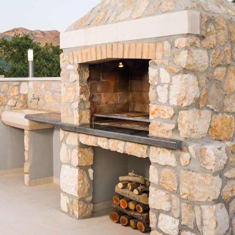 Grill up some fresh produce in the stone barbecue