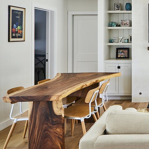 Serve up meals at the beautiful live edge wooden table