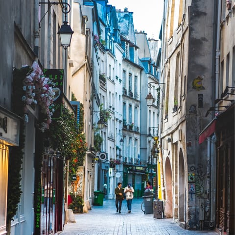 Meander the narrow pedestrian streets of Le Marais, pausing to shop in chic boutiques