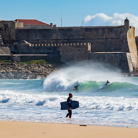 Hit the surf down at Carcavelos' stunning beach