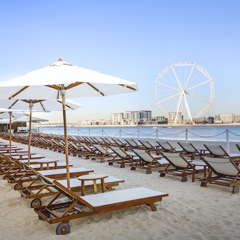 Step out onto the golden sands of JBR Beach from this oceanfront location