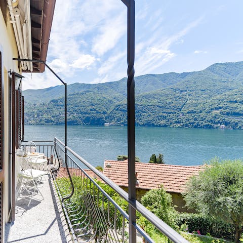 Spend the evenings sitting on the balcony and watching the sun go down over Lake Como