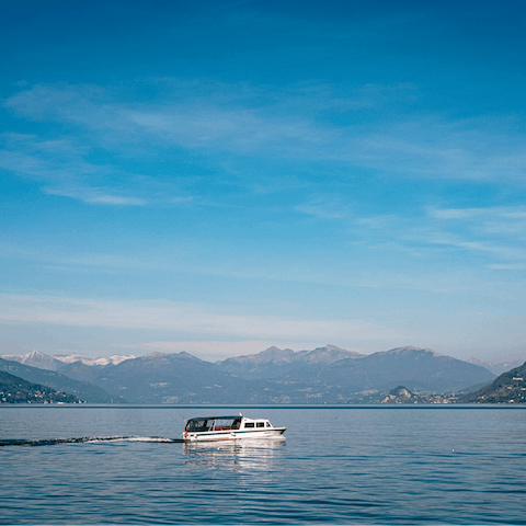 Drive ten minutes down the road to the town of Moltrasio and hire a boat for the afternoon