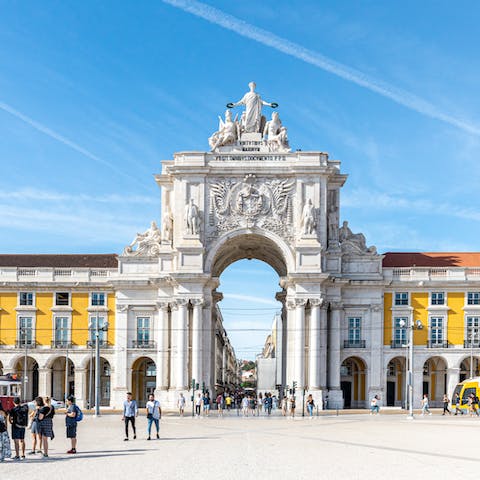 Visit Commerce Square and the Rua Augusta Arch, a fifteen-minute walk away