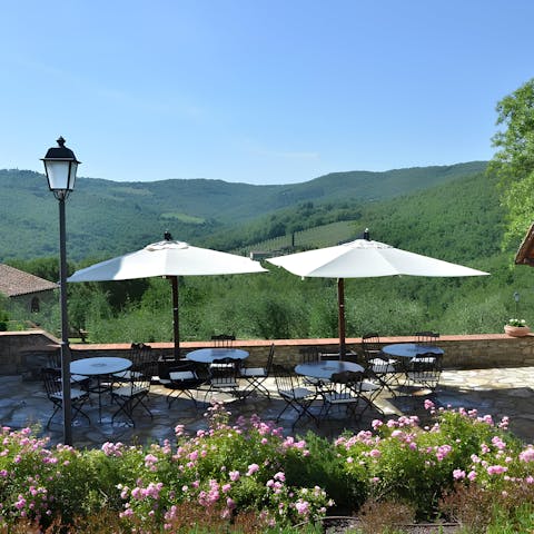 Relax on the communal terrace with a glass of Chianti wine