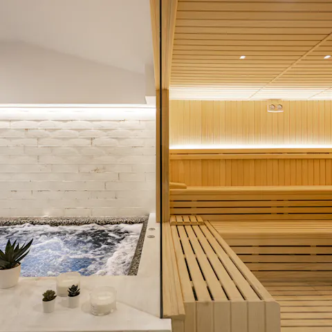 Flit between the Jacuzzi and saunas in the downstairs wellness area