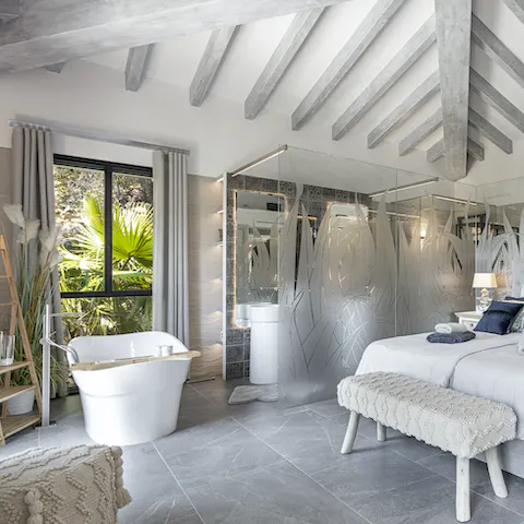 Finish the day with a reinvigorating soak in the master bedroom's freestanding bathtub