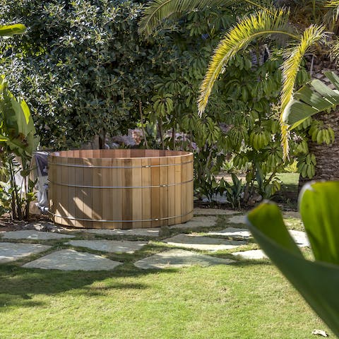 Treat your senses to a long soak in the hot tub immersed in a sanctuary of trees
