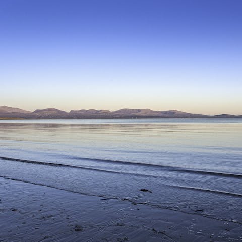 Visit the Traeth Mawr beach, only minutes away by car