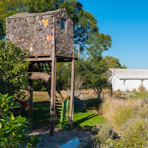 Spend a day playing with the kids in the treehouse