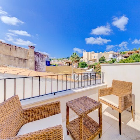 Head up to the top-floor balcony for a view over Pollensa's rooftops