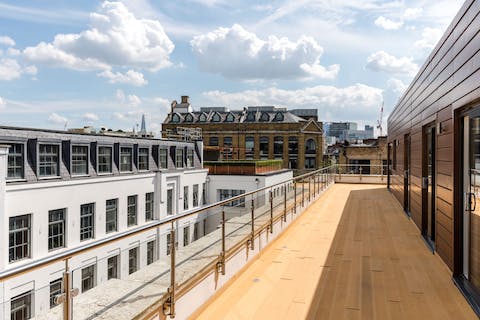 Step out onto the private balcony for rooftop views over East Central London
