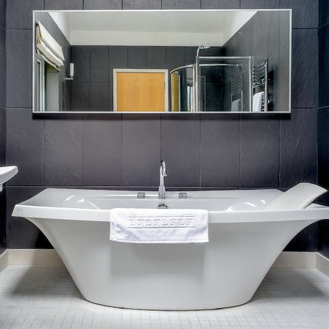 Enjoy a relaxing soak in the freestanding tub