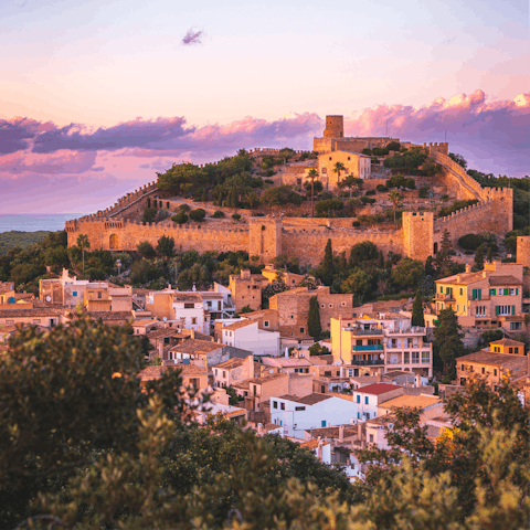 Soak up the history of nearby Capdepera Castle