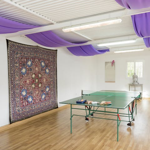 Take on a challenger at a game of table tennis in the yoga studio