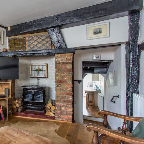 Curl up by the rustic wood-burning stove, taking in all of the original features