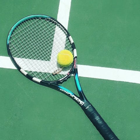 Play some tennis on the community's shared courts