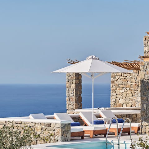 Experience the bliss of no plans other than relaxing by the pool