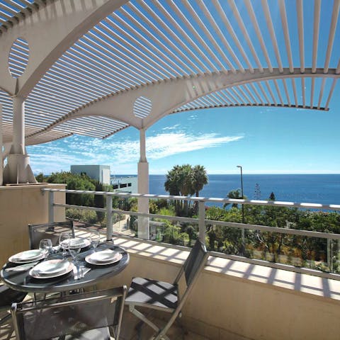 Drink or dine alfresco while enjoying spectacular sea views from the balcony