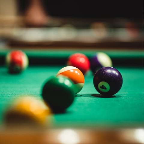 Take part in a pool match at La Pecara Del Pool, only a 3–minute walk away