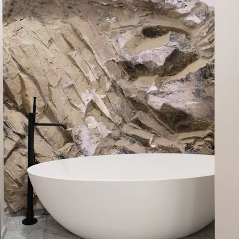 Treat yourself to a long soak in the freestanding tub