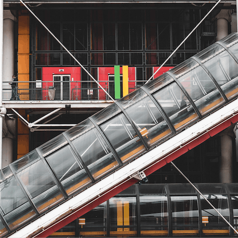 Take a fifteen-minute walk to admire the striking architecture of the Centre Pompidou
