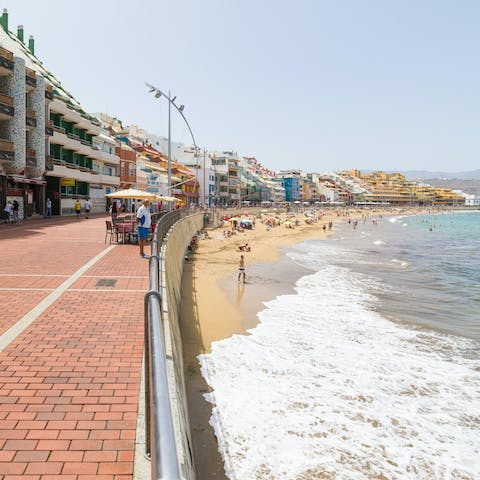 Take a morning stroll along Las Canteras Beach, just 20 metres from your door