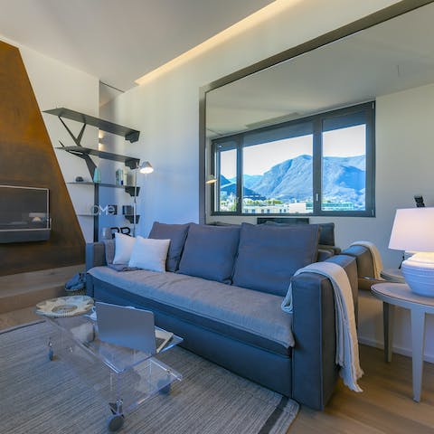 Take in sweeping mountain views from your cosy living area
