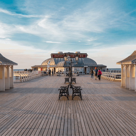 Visit Cromer's iconic Victorian pier, approximately 10 miles along the coast