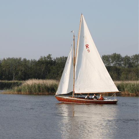 Treat yourself to a serene sail along the picturesque Norfolk Broads, a little under an hour away