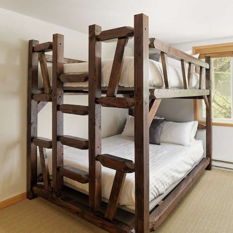 Climb into the unique queen size bunk bed