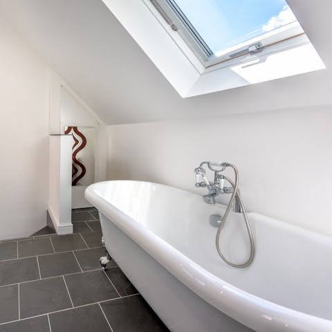 Take a long soak in the freestanding bath tub